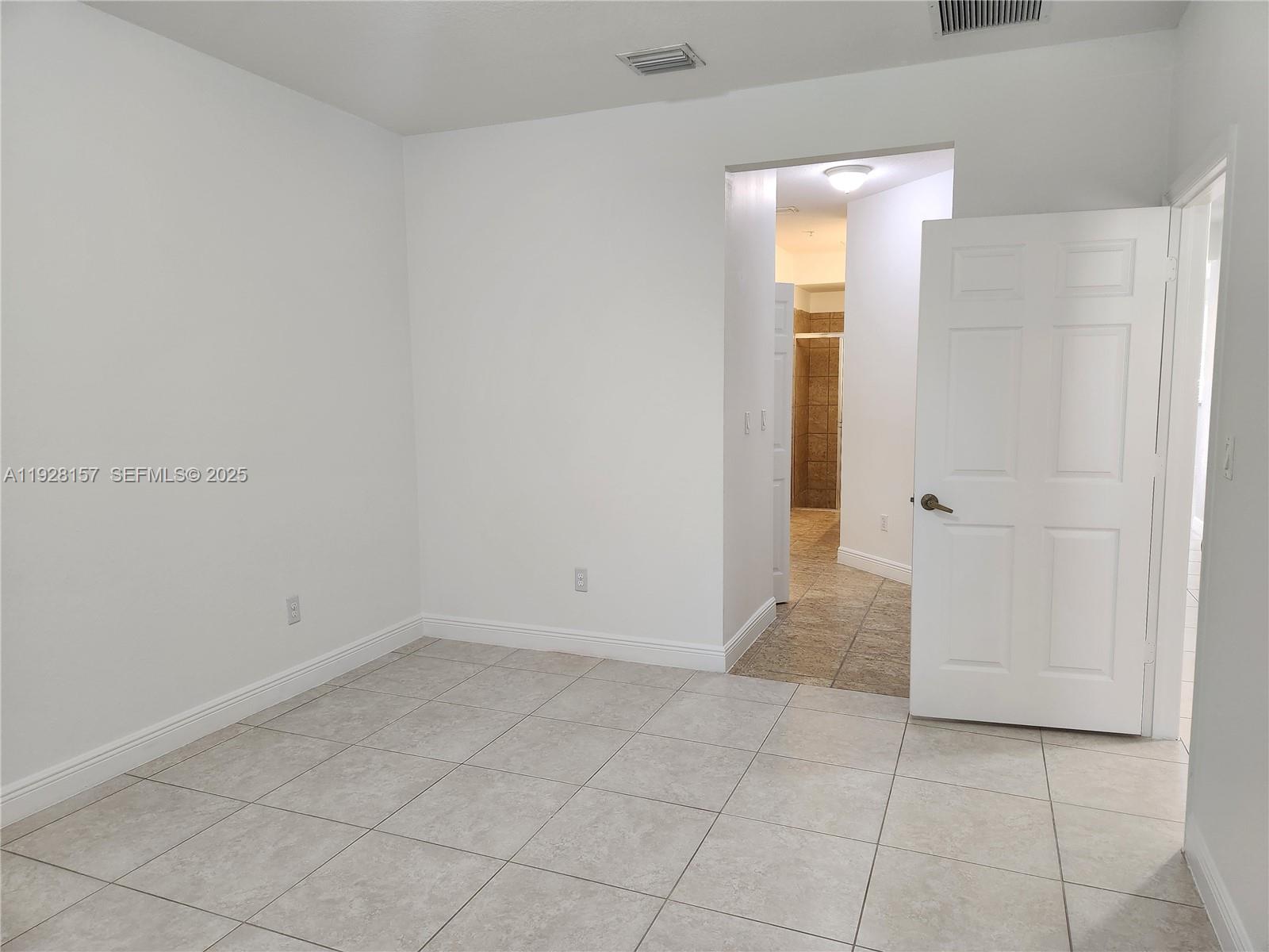14677 Southwest 9th Street, Unit 1802 Pembroke Pines, FL 33027 - Photo 7 of 18 a view of an empty room