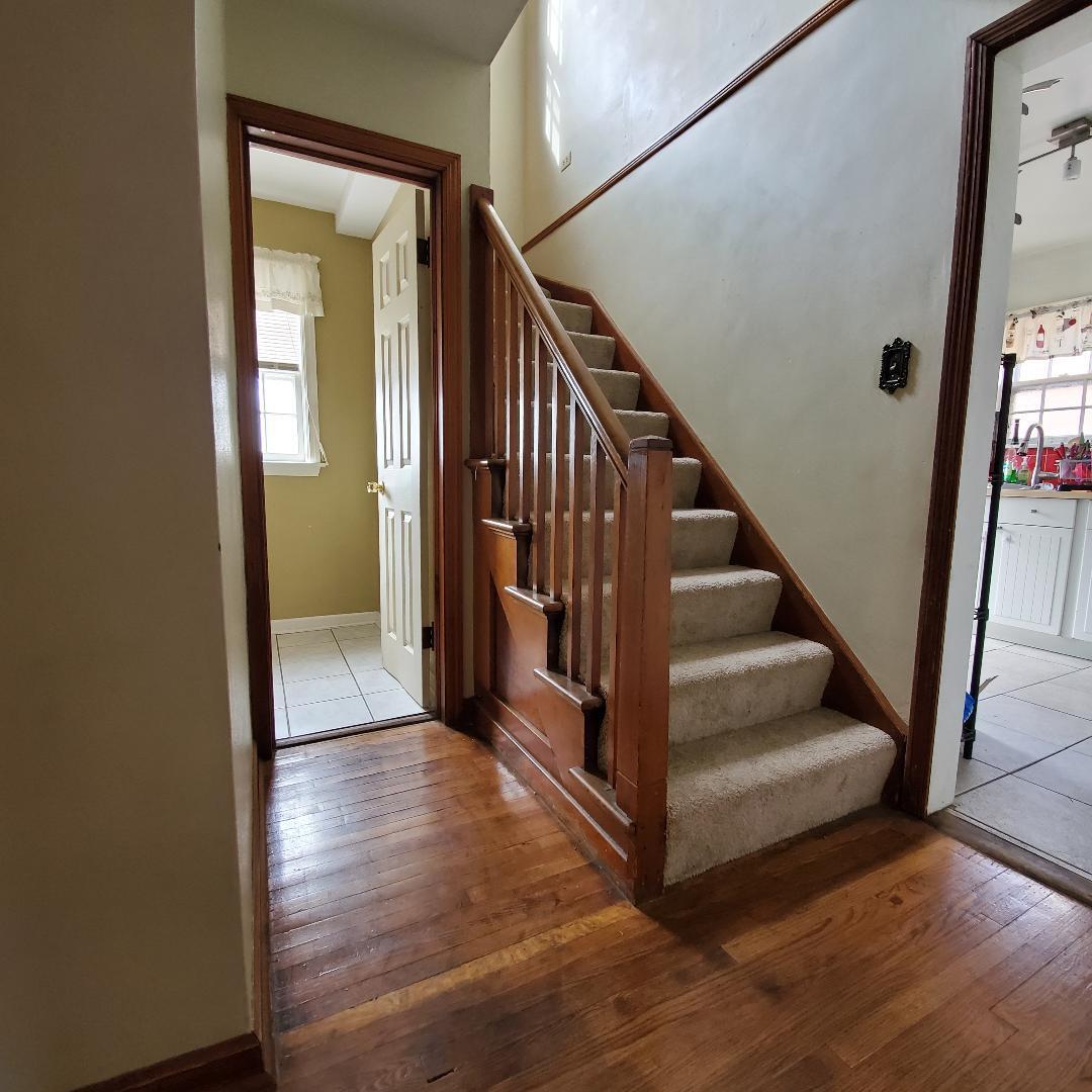 508 173rd Street Hammond, IN 46324 - Photo 29 of 61 a view of a hallway with wooden floor and entryway
