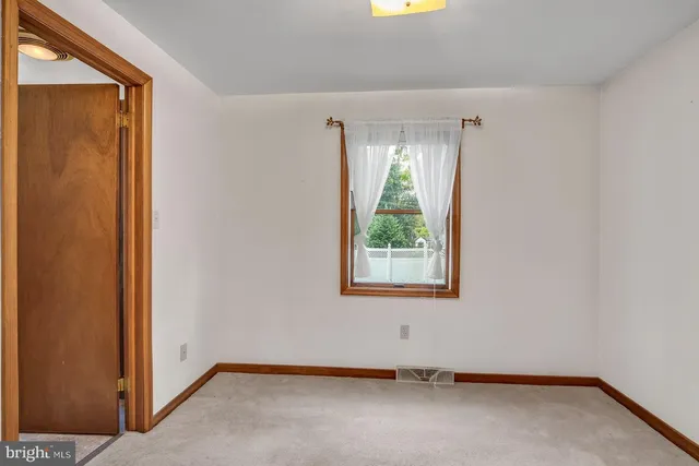 an empty room with a window