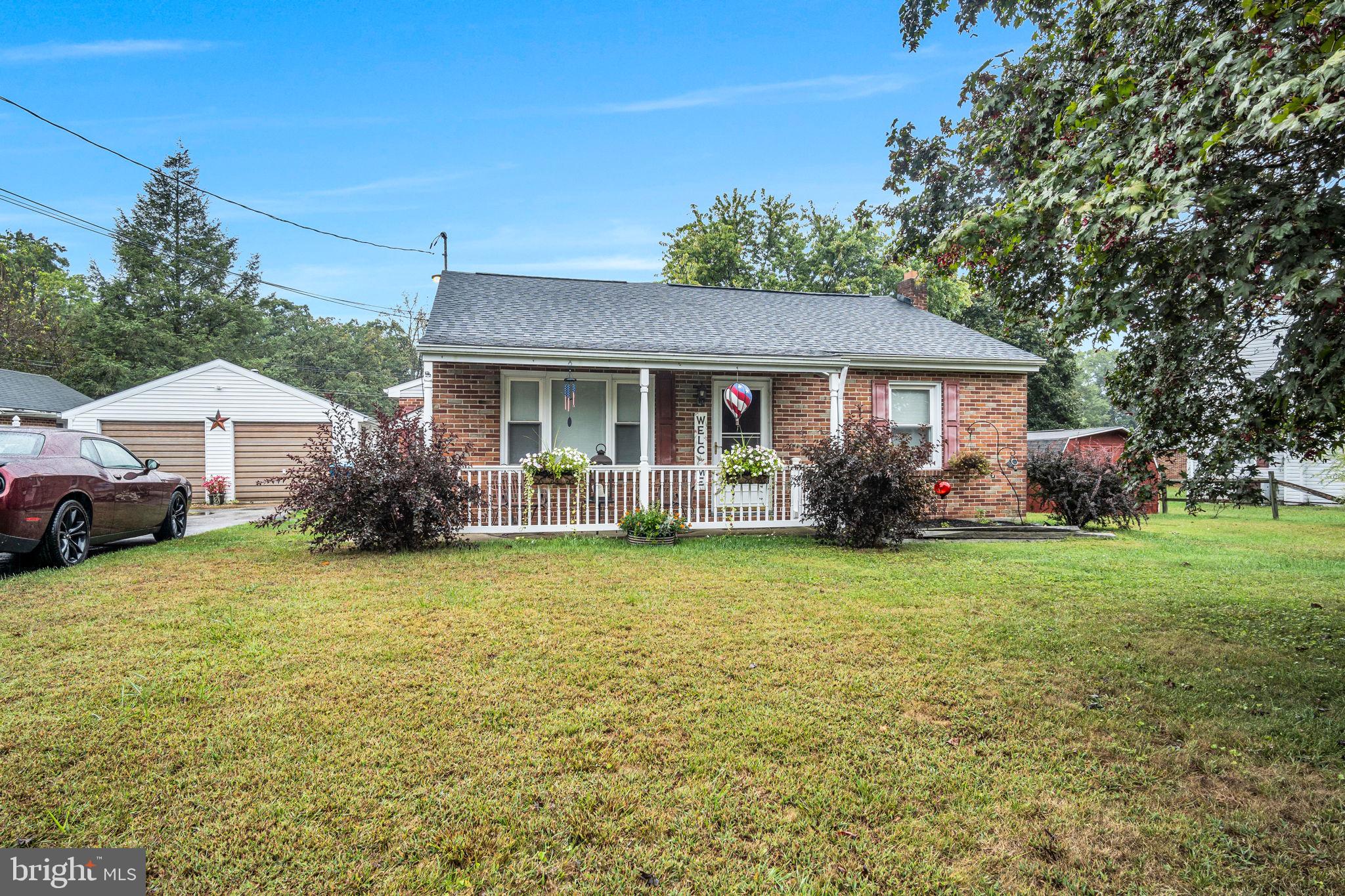 1036 Smith Hill Road York, PA 17408 - Photo 23 of 31 a front view of a house with garden