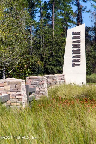 a view of a lake with a yard