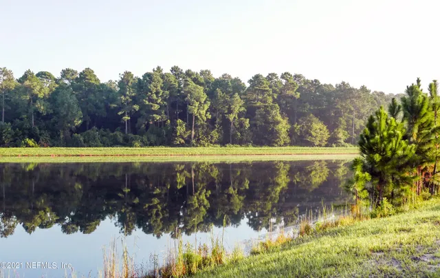 a view of a lake view with a yard