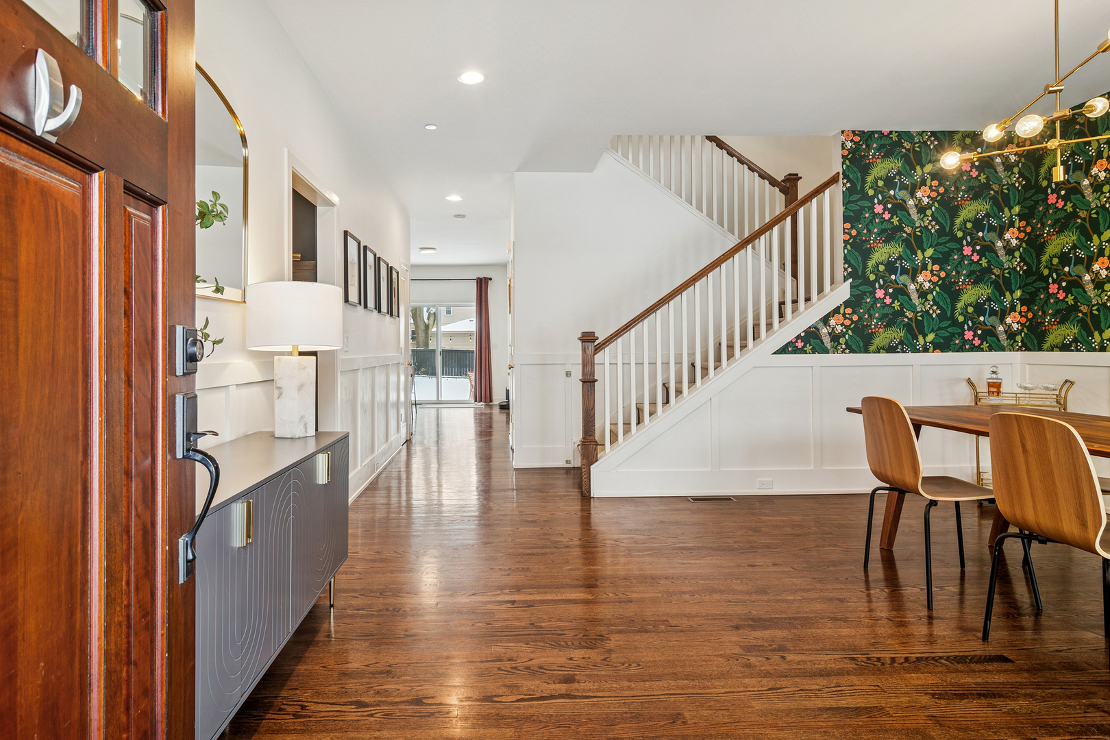 302 North Elm Street Mount Prospect, IL 60056 - Photo 3 of 39 a view of a hallway with furniture and wooden floor