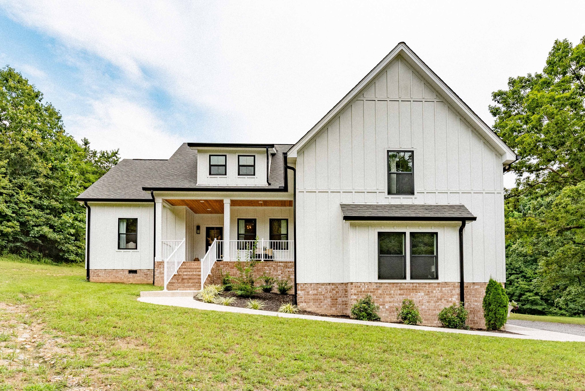 519 Ab Wade Road Portland, TN 37148 - Photo 1 of 49 a front view of a house with a yard