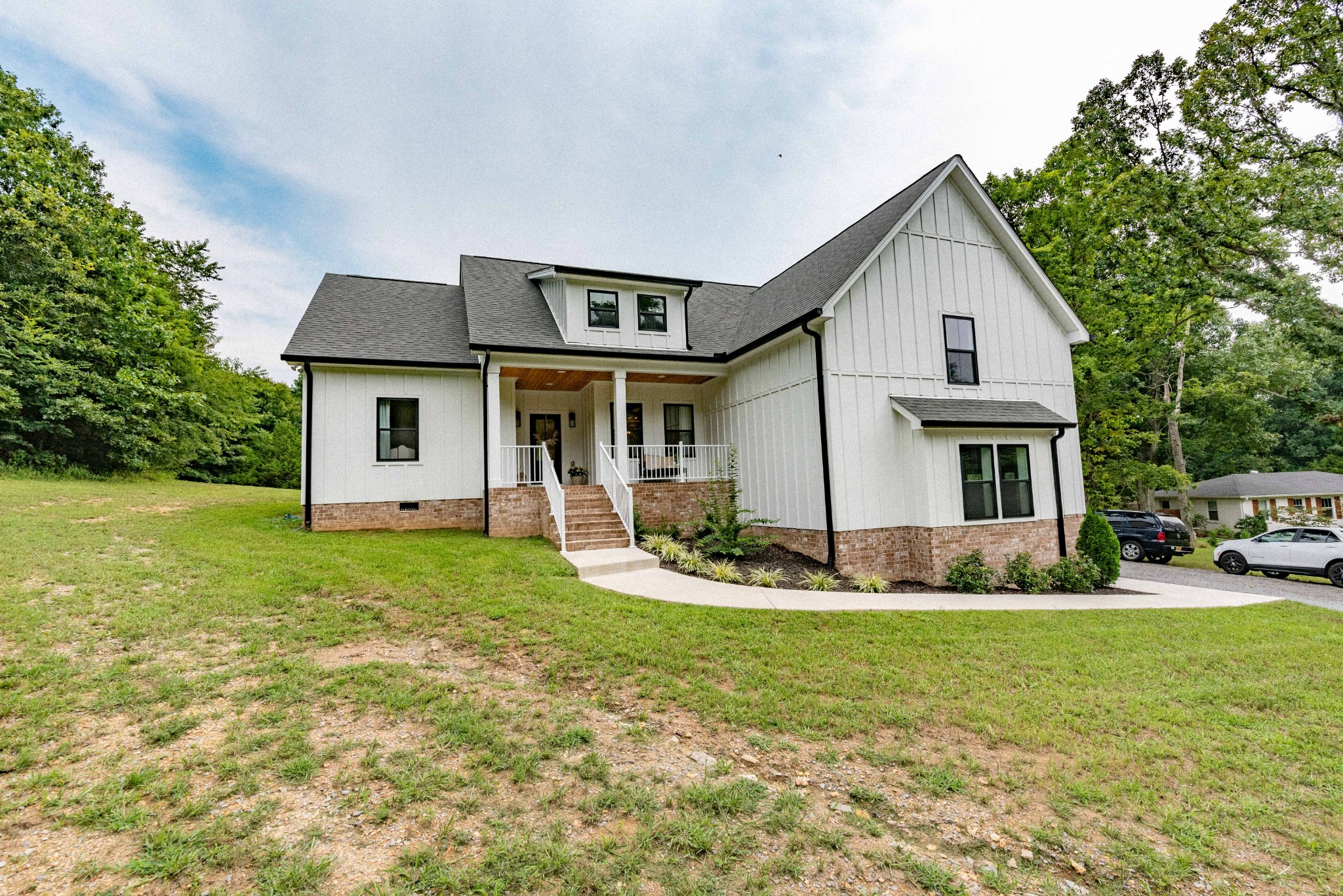 519 Ab Wade Road Portland, TN 37148 - Photo 2 of 49 a front view of house with yard and green space