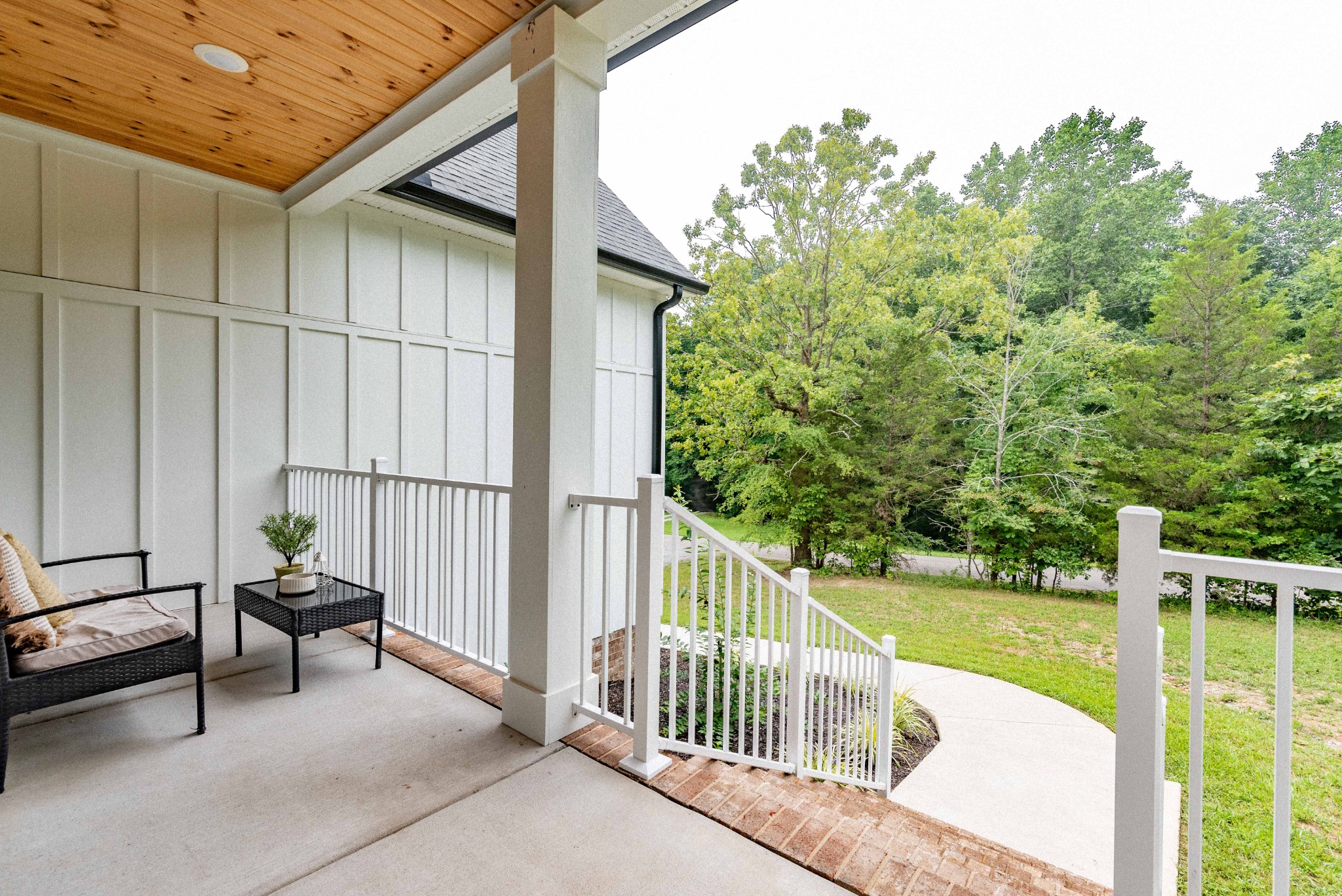 519 Ab Wade Road Portland, TN 37148 - Photo 7 of 49 a view of a porch with furniture and garden