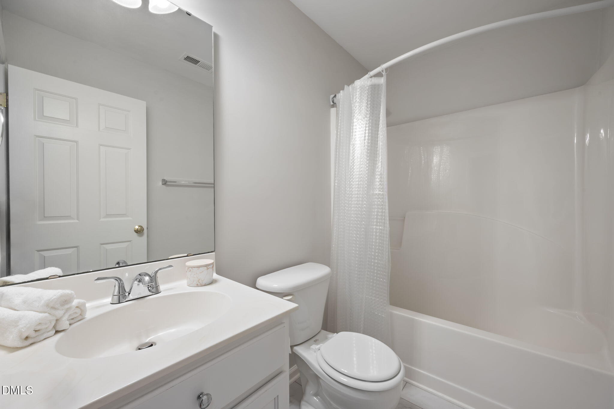 1008 Scotts Ridge Trail Apex, NC 27502 - Photo 37 of 57 a bathroom with a sink toilet and shower