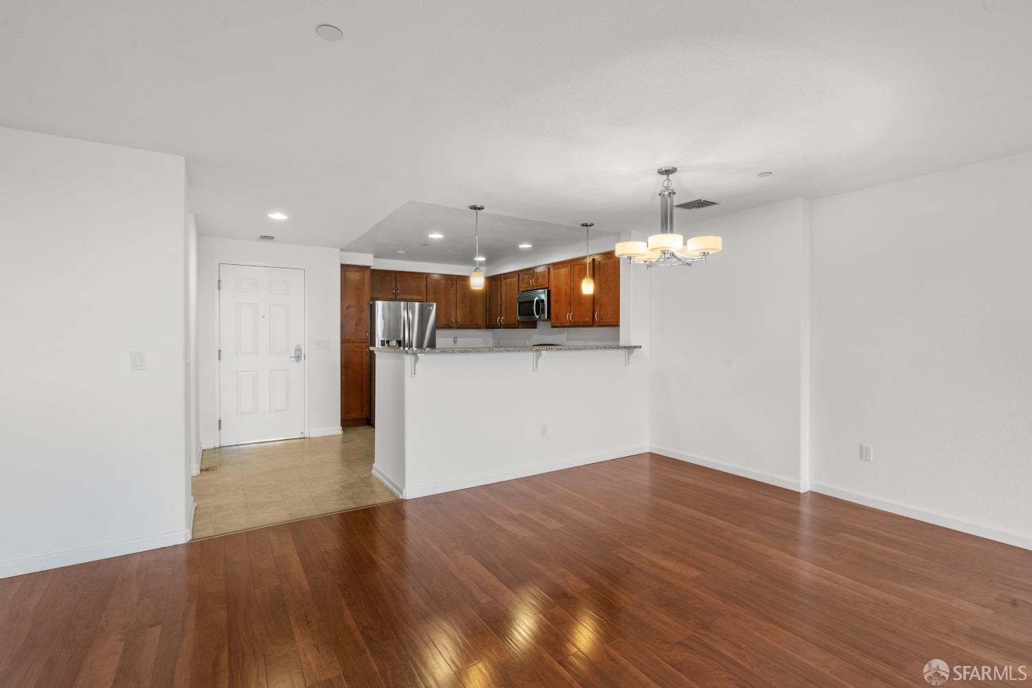 1353 El Camino Real Millbrae, CA 94030 - Photo 13 of 25 a view of a kitchen with a sink and a refrigerator