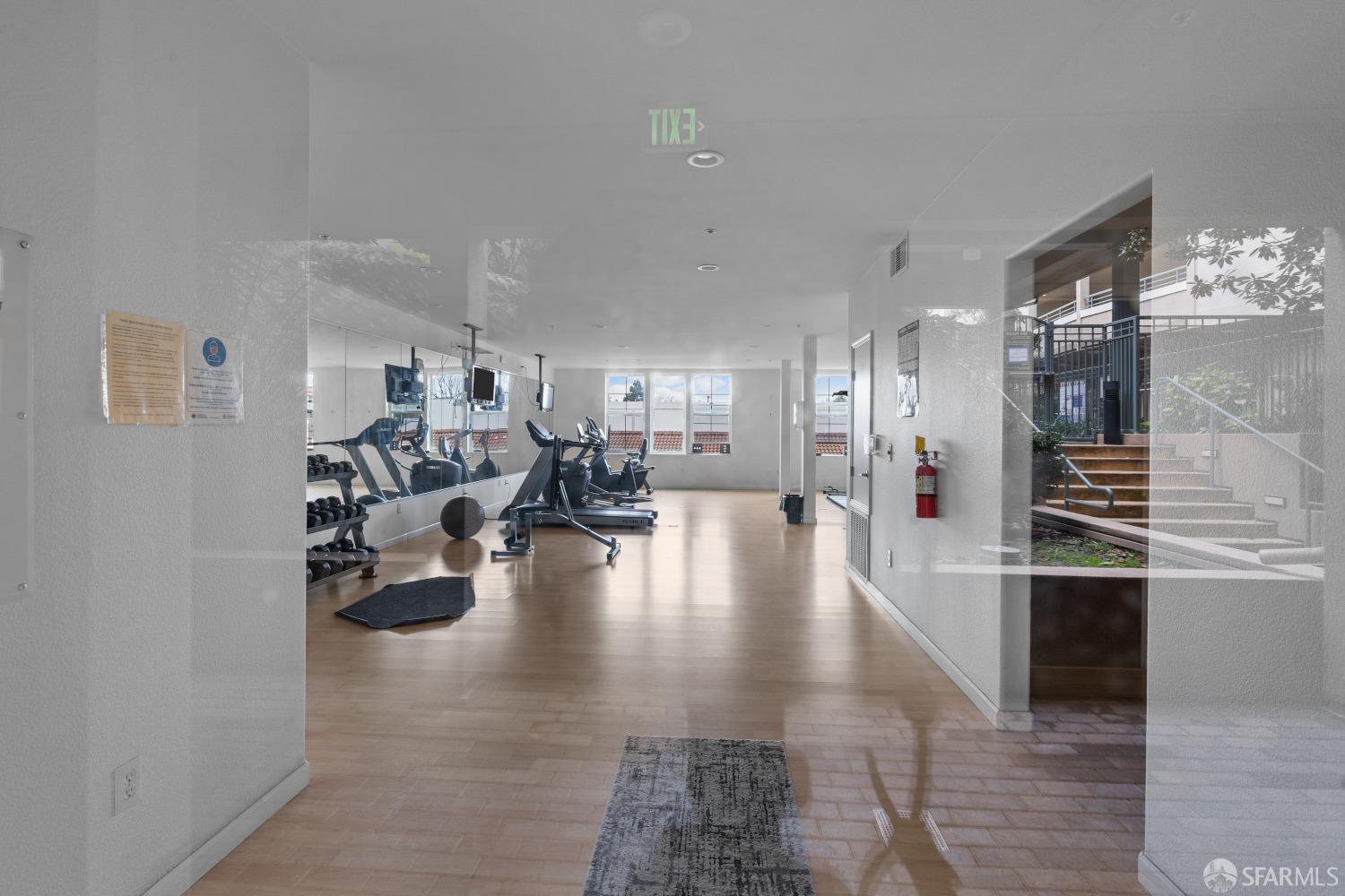 1353 El Camino Real Millbrae, CA 94030 - Photo 21 of 25 a living room with lots of furniture and kitchen view