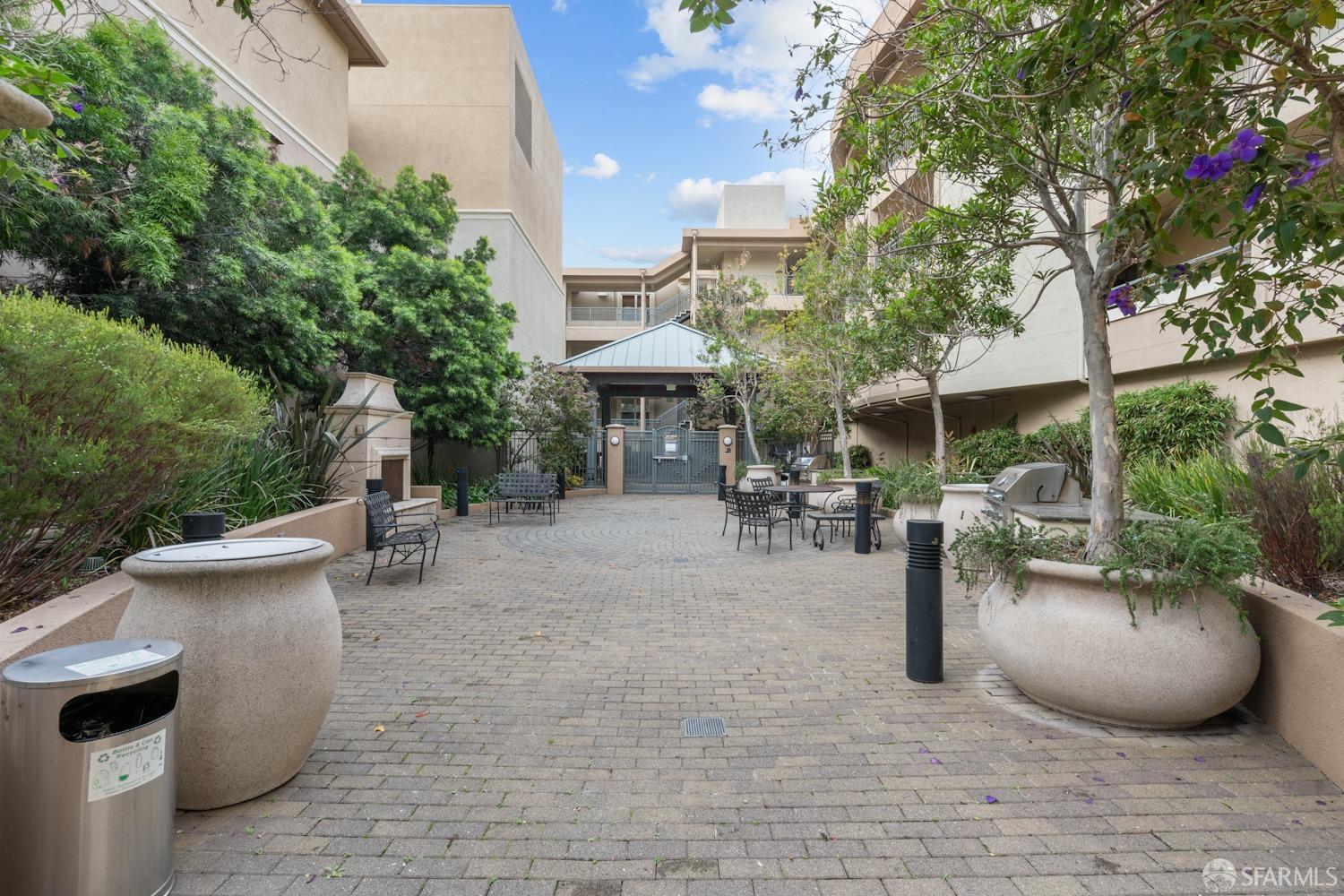 1353 El Camino Real Millbrae, CA 94030 - Photo 22 of 25 a view of a patio with table and chairs and potted plants