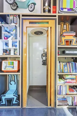 a view of front door with wooden floor