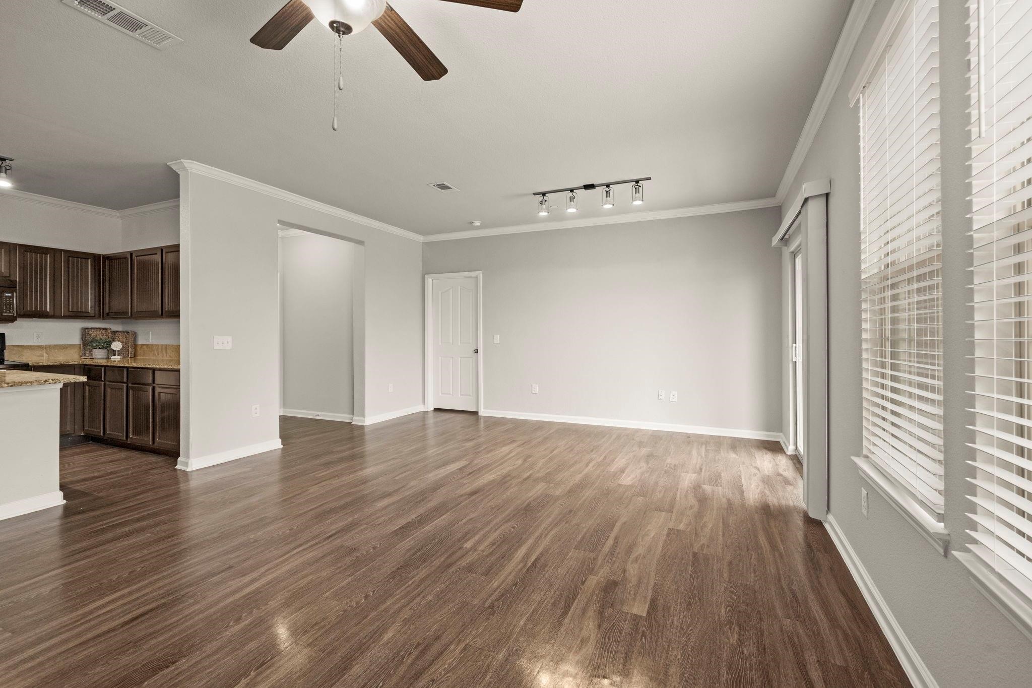30685 Fm 2978 Road, Unit 4002 Magnolia, TX 77354 - Photo 16 of 16 a view of empty room with wooden floor and window