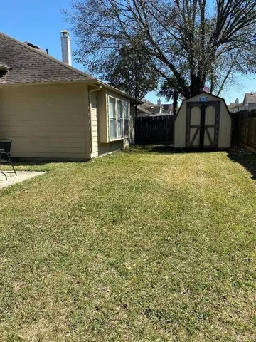 a house with trees in front of it
