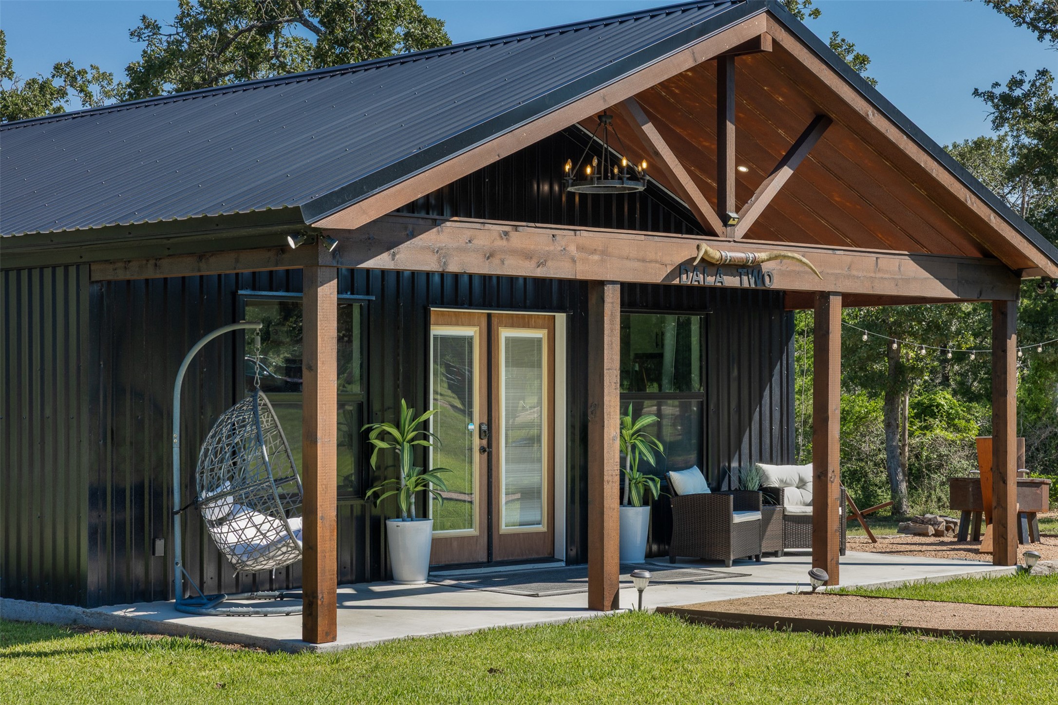 7541 Halamicek Loop Fayetteville, TX 78940 - Photo 2 of 29 a view of a entrance gate of the house