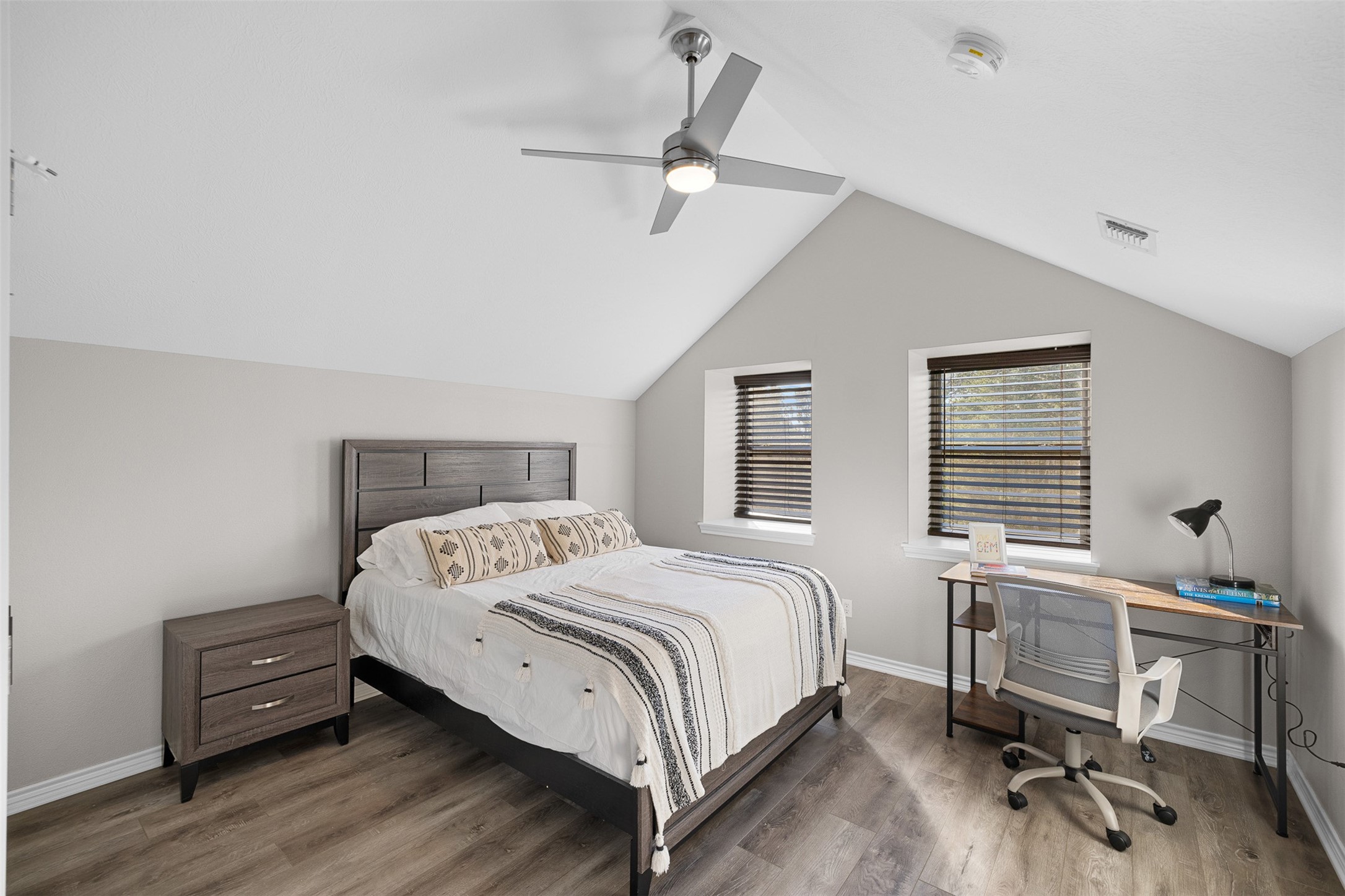 7541 Halamicek Loop Fayetteville, TX 78940 - Photo 25 of 29 a bedroom with a bed and a desk