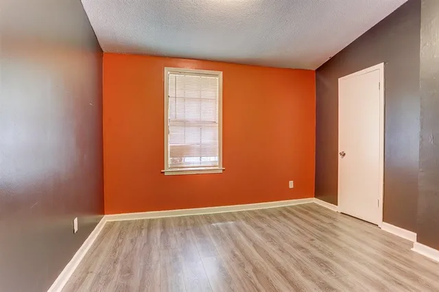 an empty room and window