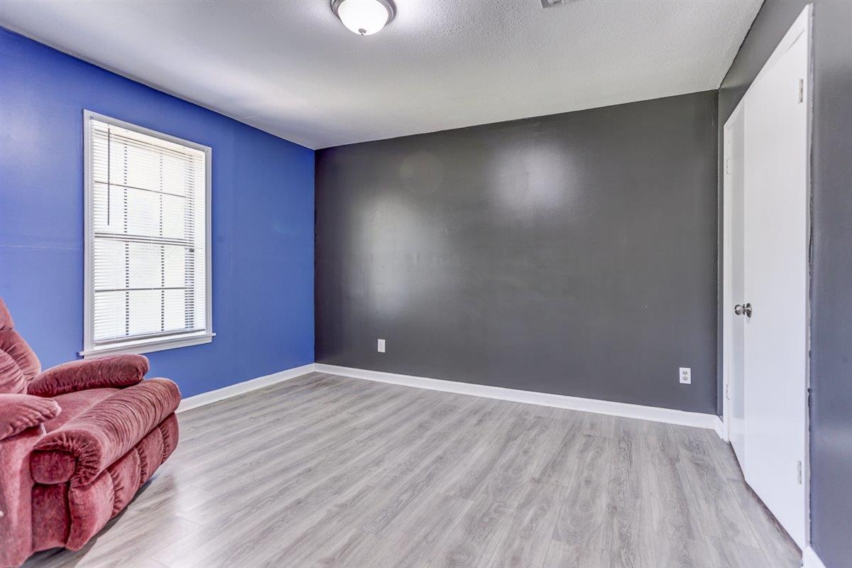 3700 Lakeview Road Memphis, TN 38116 - Photo 35 of 40 a view of livingroom with hardwood floor and window