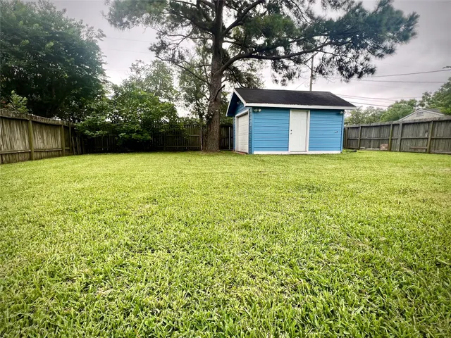 a house view with a garden space