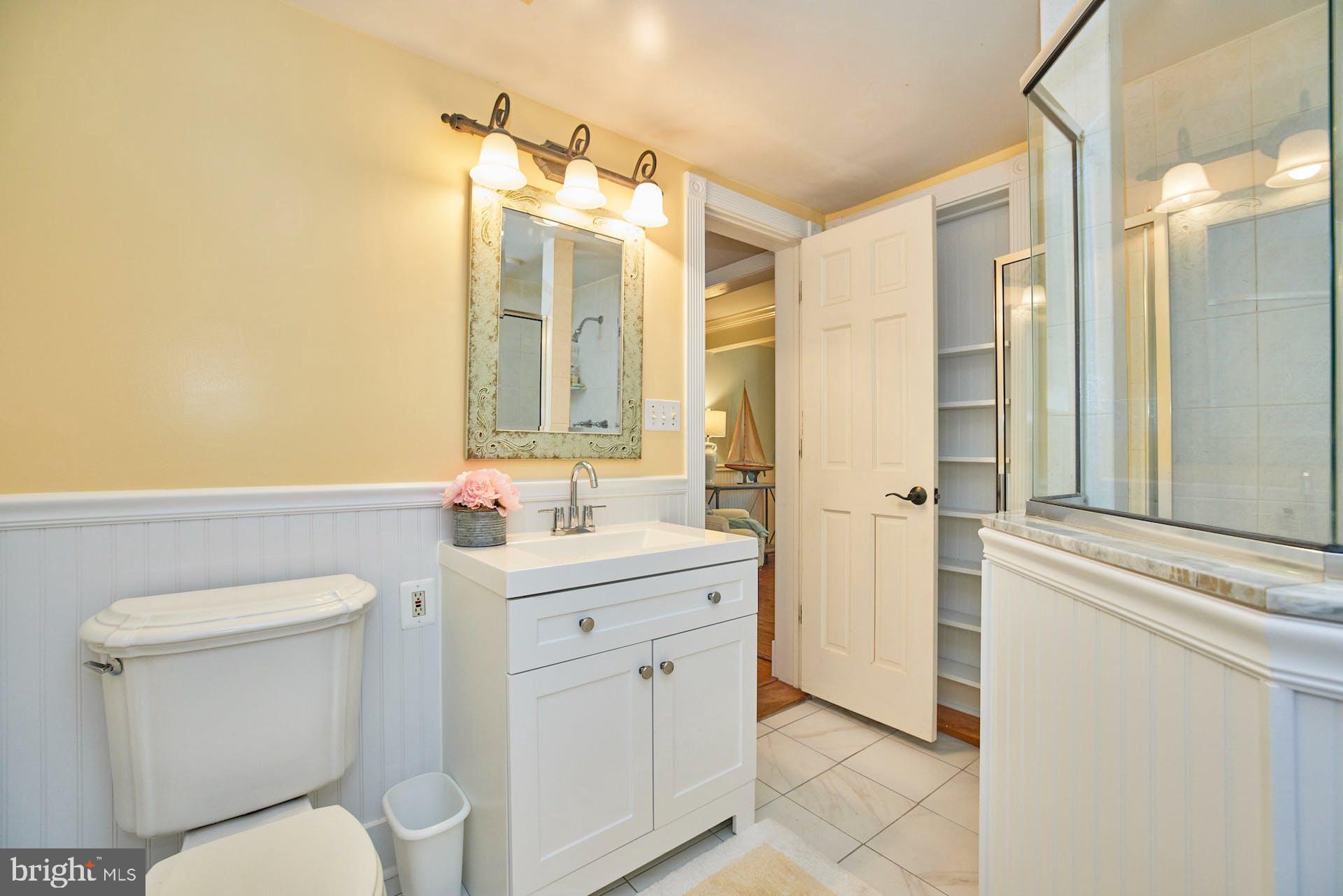 182 West Bay Front Road Lothian, MD 20711 - Photo 33 of 87 Main level full bathroom with door from porch!