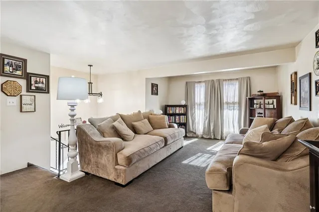 a living room with furniture and a couch