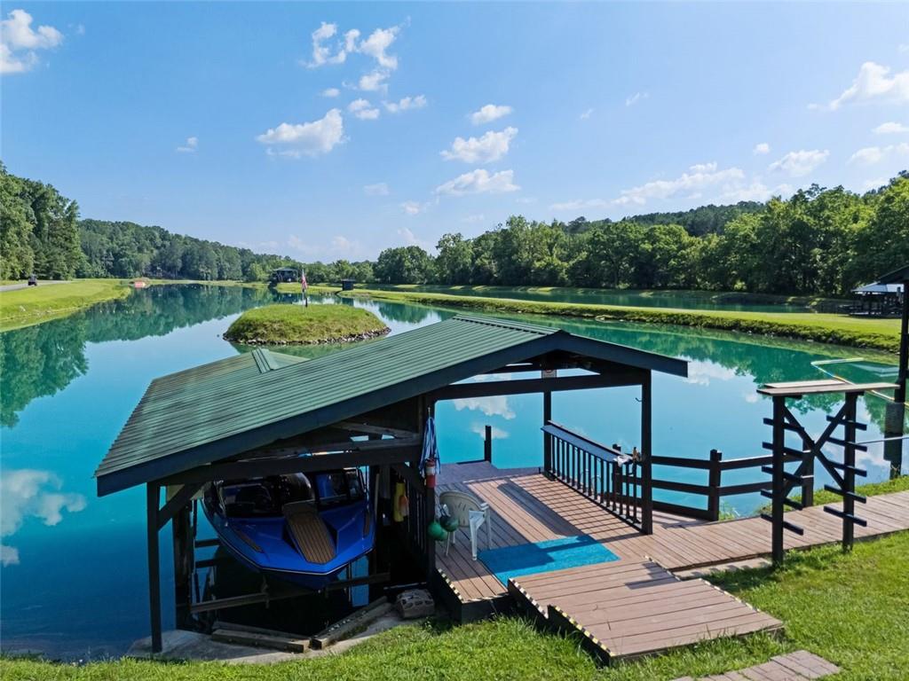 129 Jump Street Talking Rock, GA 30175 - Photo 35 of 45 a view of swimming pool with lawn chairs and a yard