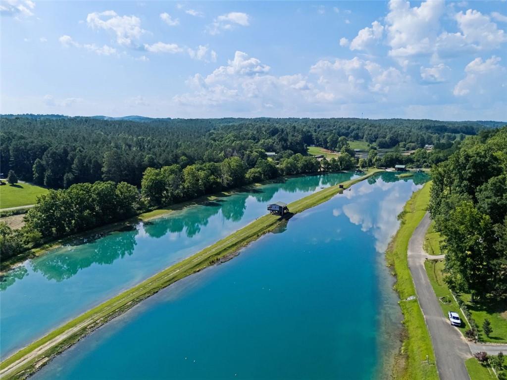 129 Jump Street Talking Rock, GA 30175 - Photo 42 of 45 a view of a lake with a city