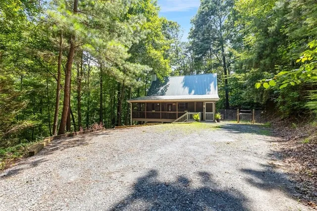 a view of swimming pool with a backyard