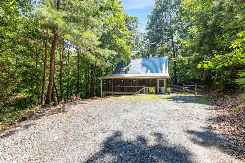 129 Jump Street Talking Rock, GA 30175 - Photo 6 of 45 a view of swimming pool with a backyard