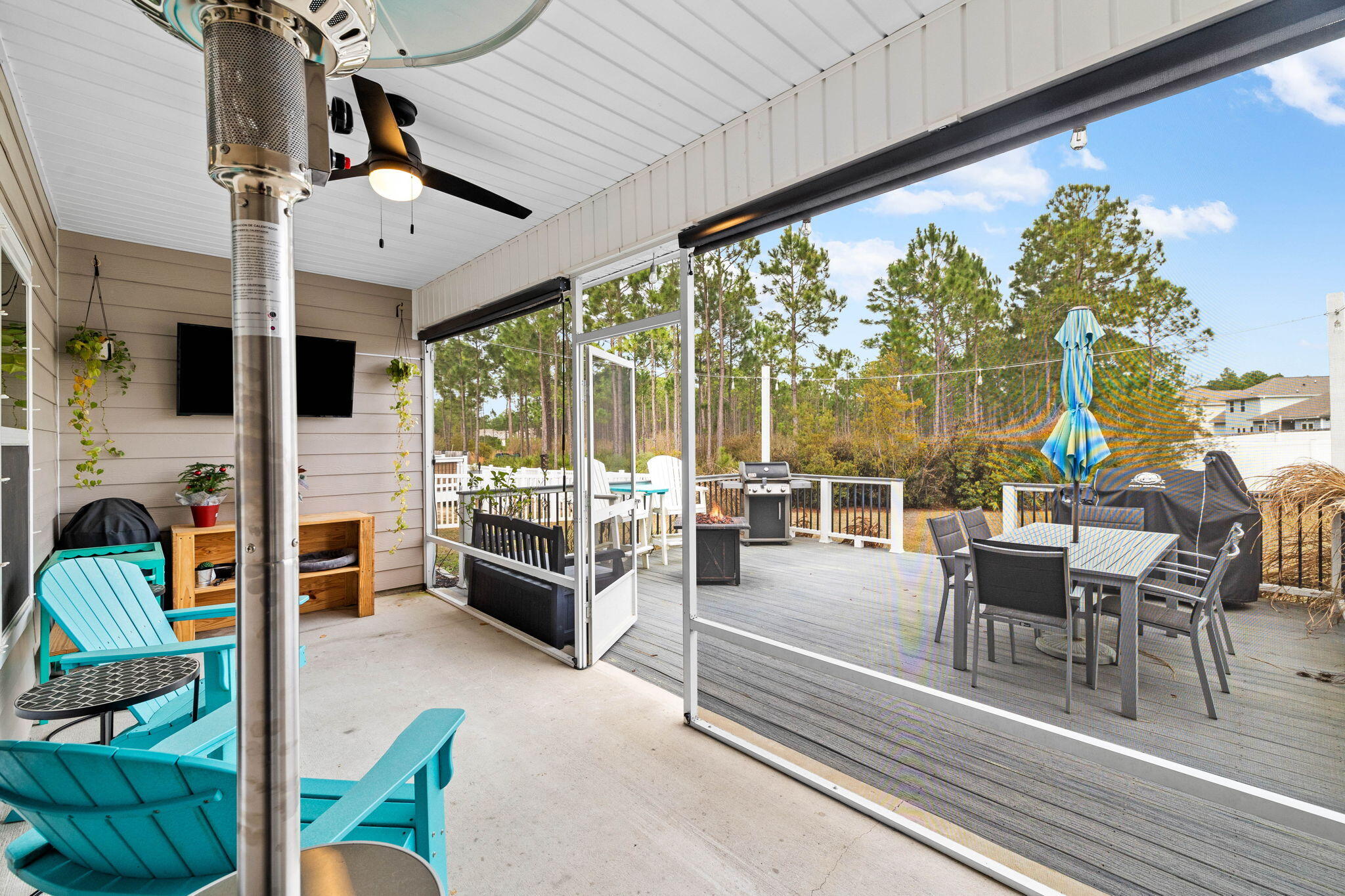 672 Alderberry Road Santa Rosa Beach, FL 32459 - Photo 18 of 24 a outdoor space with patio the couches and a dining table with garden view