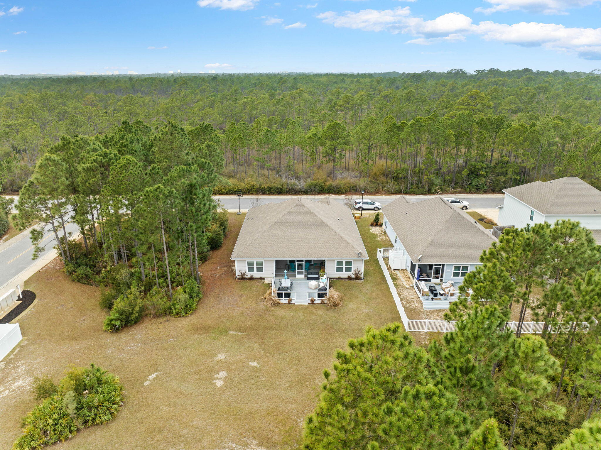 672 Alderberry Road Santa Rosa Beach, FL 32459 - Photo 4 of 24 an aerial view of residential houses with outdoor space and trees
