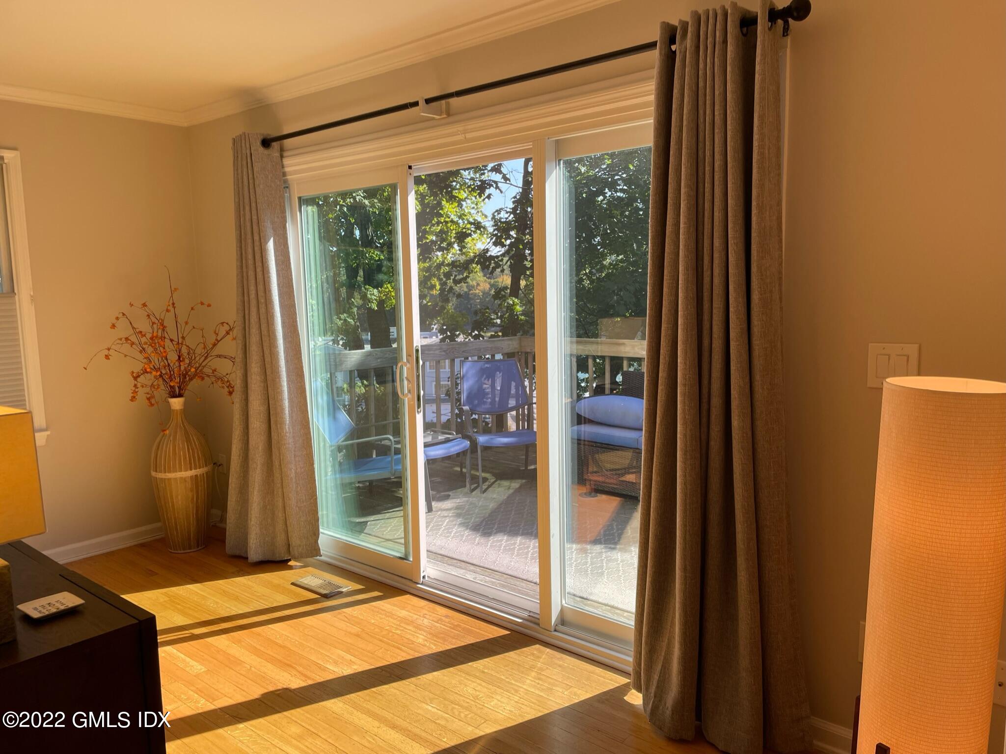 78 River Road, Unit 16 Cos Cob, CT 06807 - Photo 18 of 40 Sliding door to deck