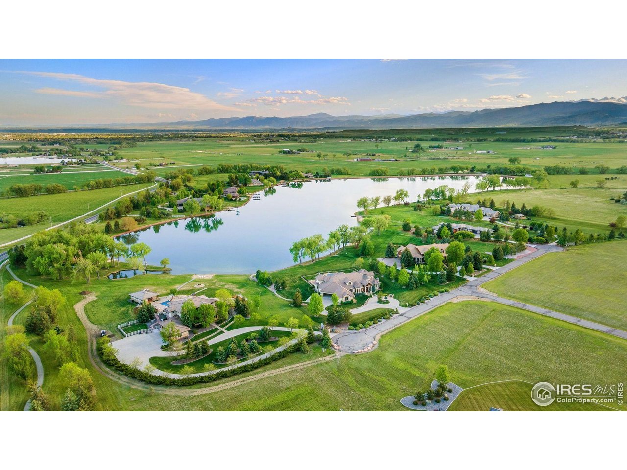 9715 Meadow Ridge Lane Longmont, CO 80504 - Photo 2 of 23 Aerial view of Meadow Green Farm neighborhood around Crystal Lake.