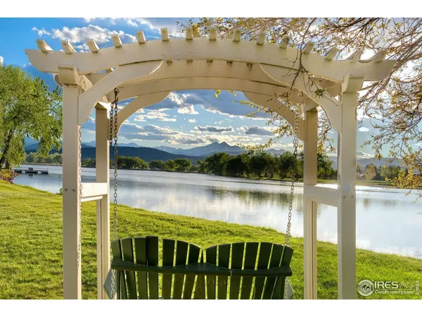 a view of swimming pool from a lake view