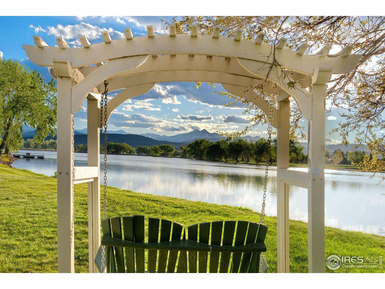 9715 Meadow Ridge Lane Longmont, CO 80504 - Photo 3 of 23 Enjoy access to Crystal Lake for picnics, paddle boarding, non motorized boats, and fishing.