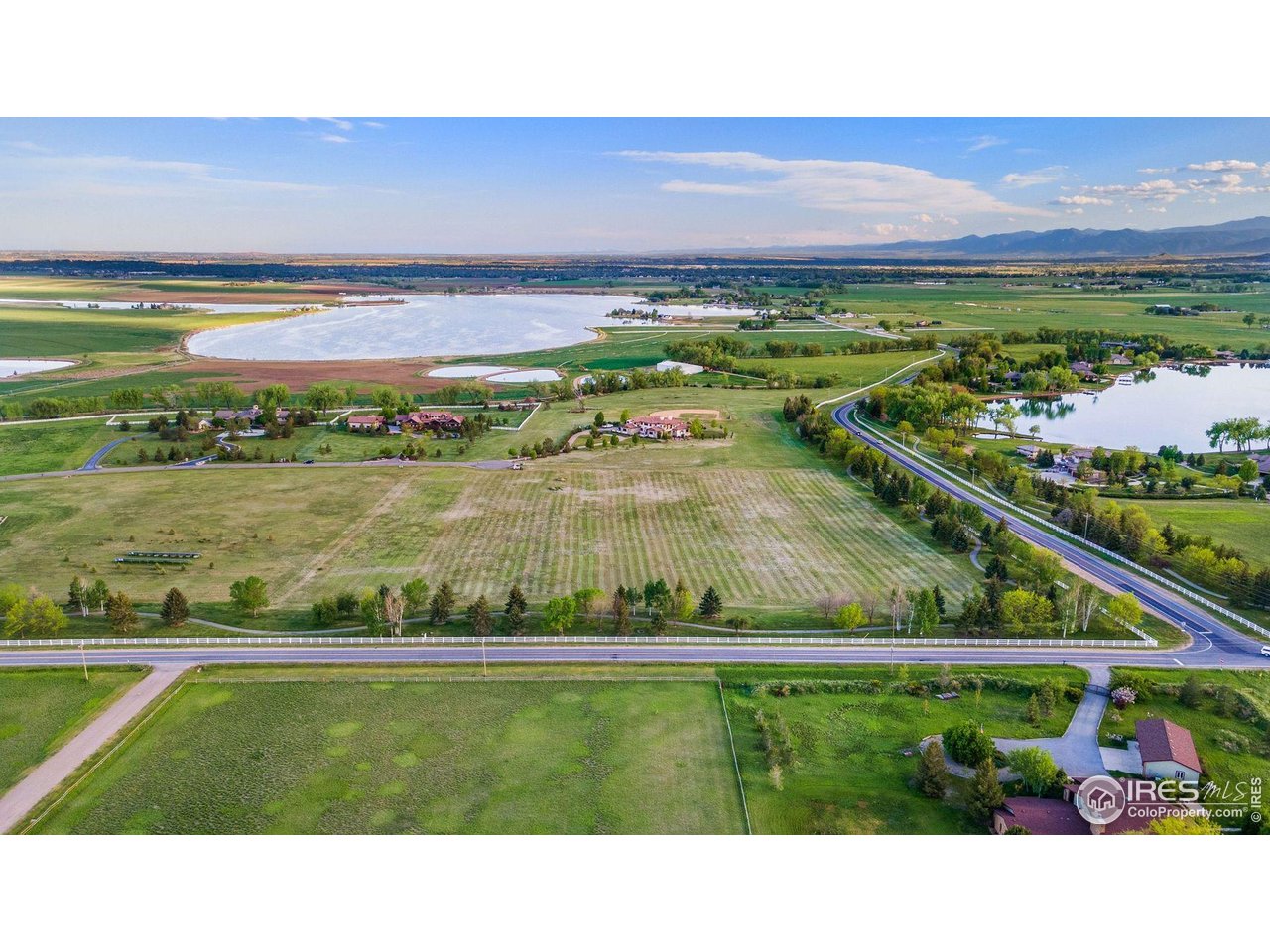 9715 Meadow Ridge Lane Longmont, CO 80504 - Photo 8 of 23 Neighbors to the south. View of lot with Terry Lake and Crystal Lake.