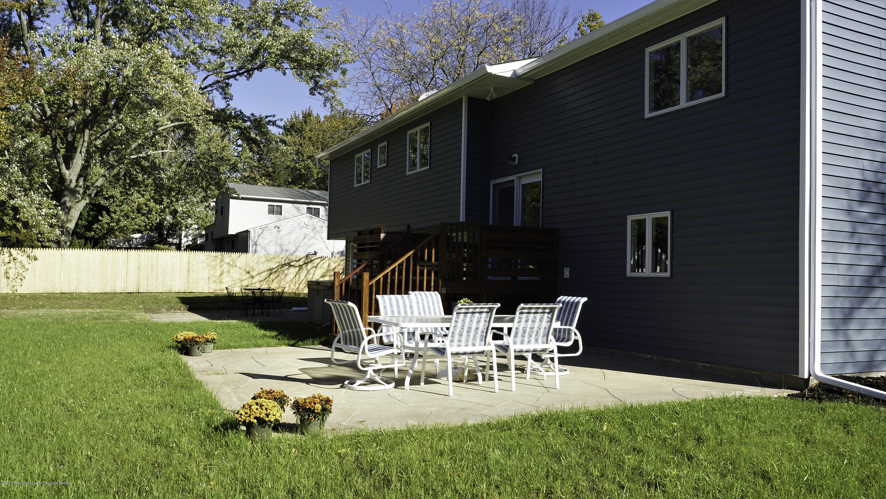 524 E Road Middletown, NJ 07718 - Photo 38 of 40 a view of backyard of house with seating space
