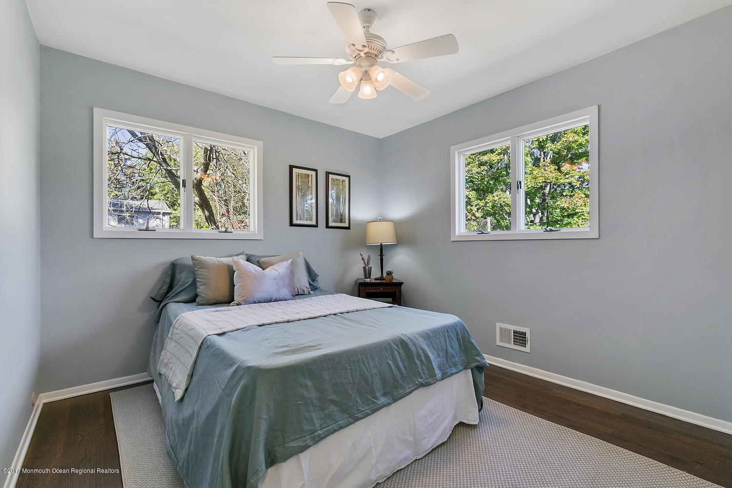 524 E Road Middletown, NJ 07718 - Photo 8 of 40 a bedroom with a bed and a painting on the wall