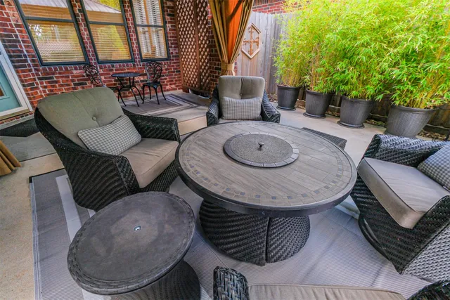 a view of livingroom with furniture and potted plants