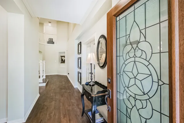 a view of a entryway with wooden floor