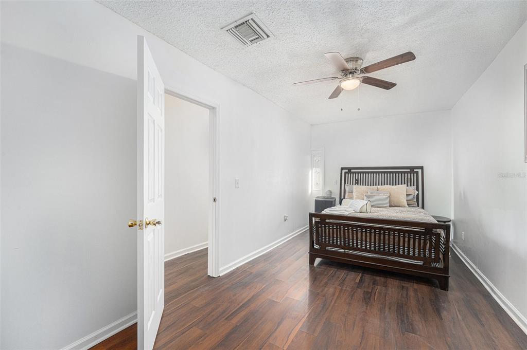 4609 Horton Road Plant City, FL 33567 - Photo 29 of 47 a view of bedroom with wooden floor