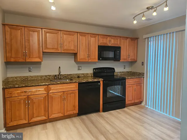 a bathroom with a shower and a bath tub