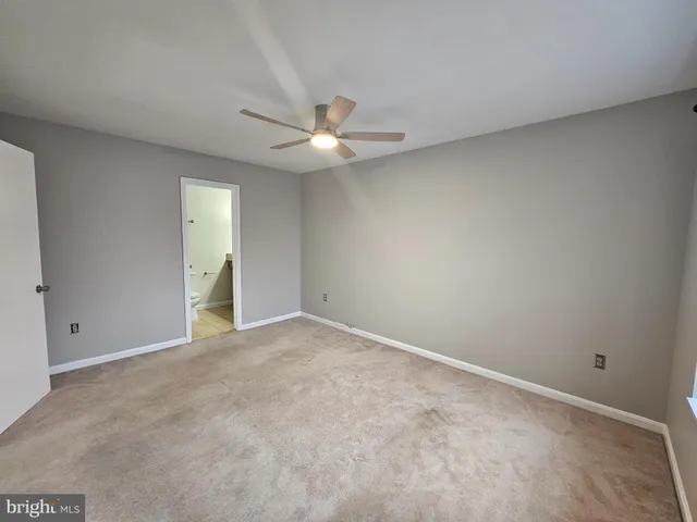 a bathroom with a sink mirror toilet and bathtub