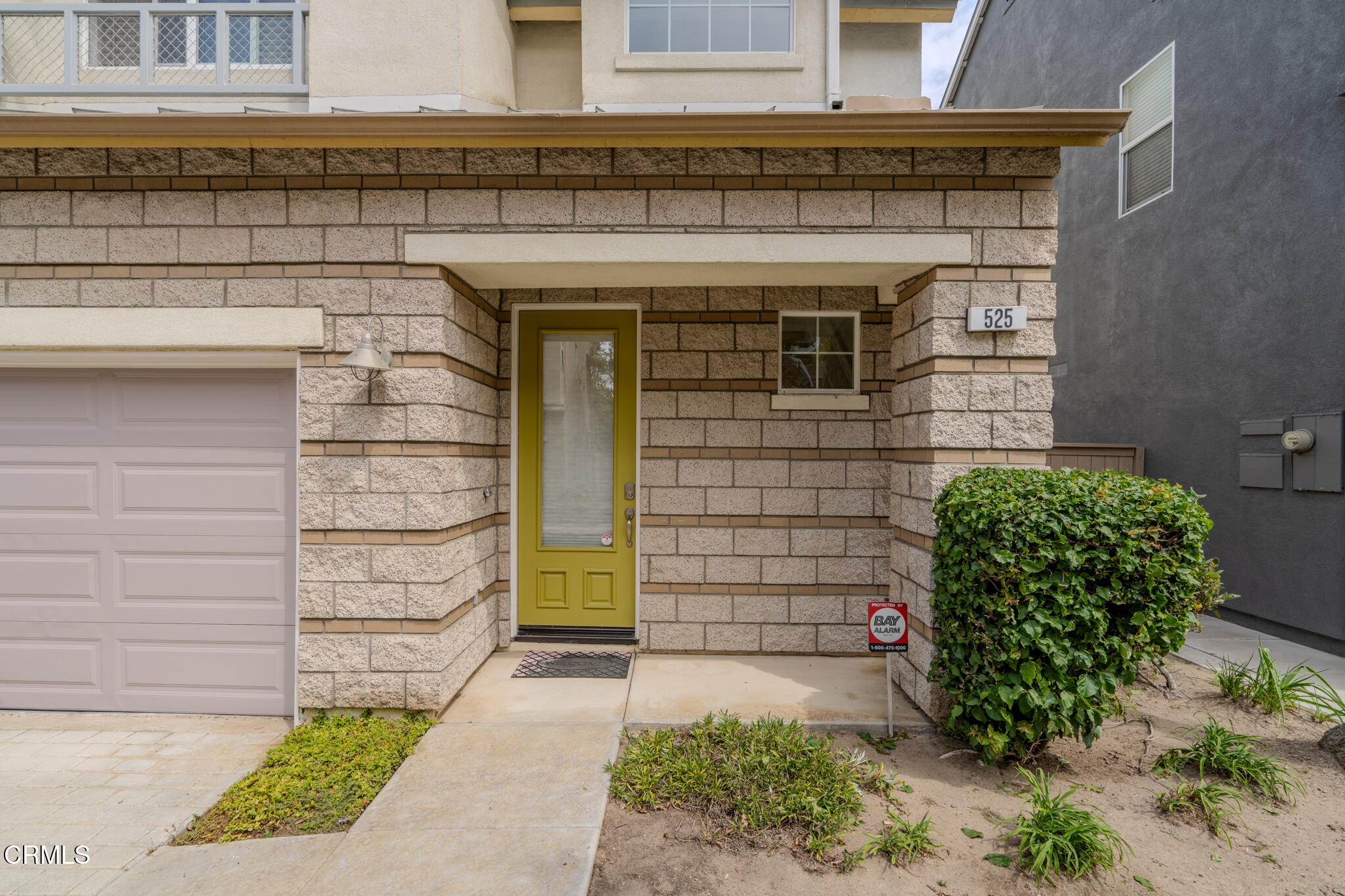 525 Shell Harbor Lane Port Hueneme, CA 93041 - Photo 4 of 47 a front view of a house with a garden