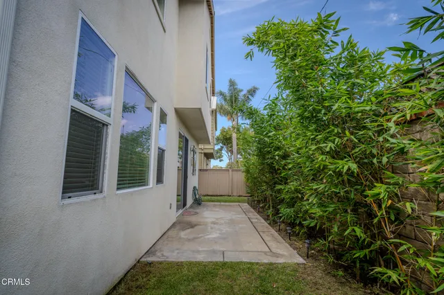 a view of a backyard of the house