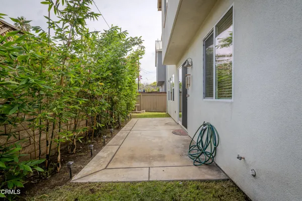 a view of a back yard of the house