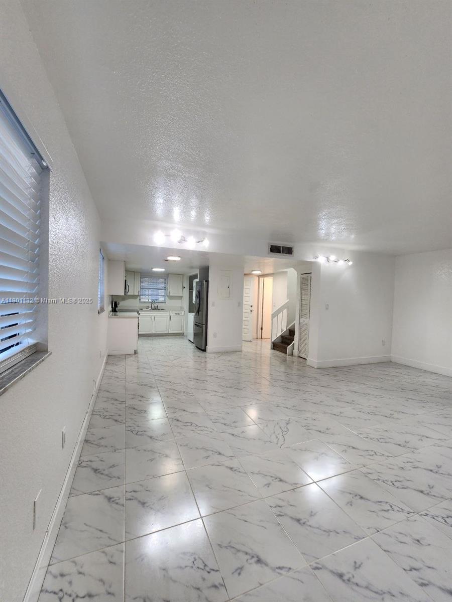 5100 West 12th Lane, Unit E7 Hialeah, FL 33012 - Photo 15 of 35 a view of a storage & utility room