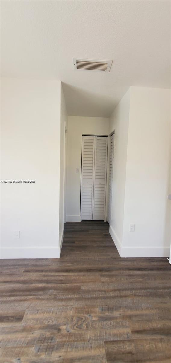 5100 West 12th Lane, Unit E7 Hialeah, FL 33012 - Photo 26 of 35 a view of an empty room