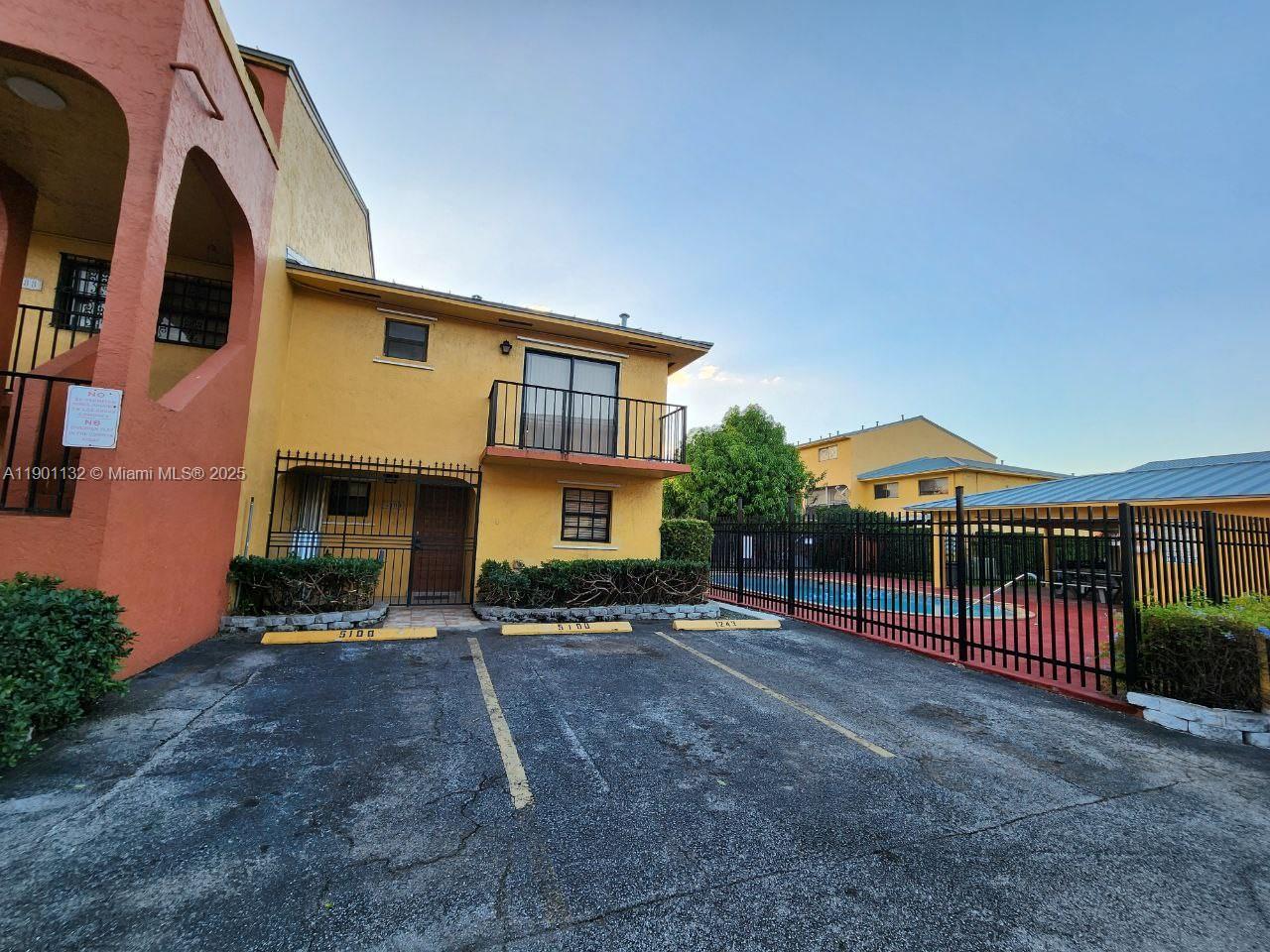 5100 West 12th Lane, Unit E7 Hialeah, FL 33012 - Photo 34 of 35 a view of a building with many windows