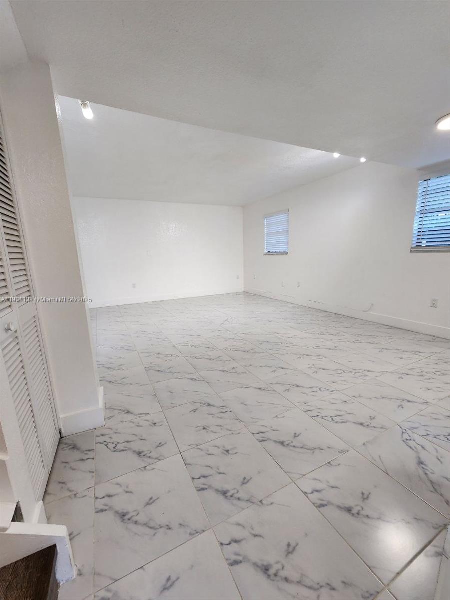 5100 West 12th Lane, Unit E7 Hialeah, FL 33012 - Photo 5 of 35 a view of empty room