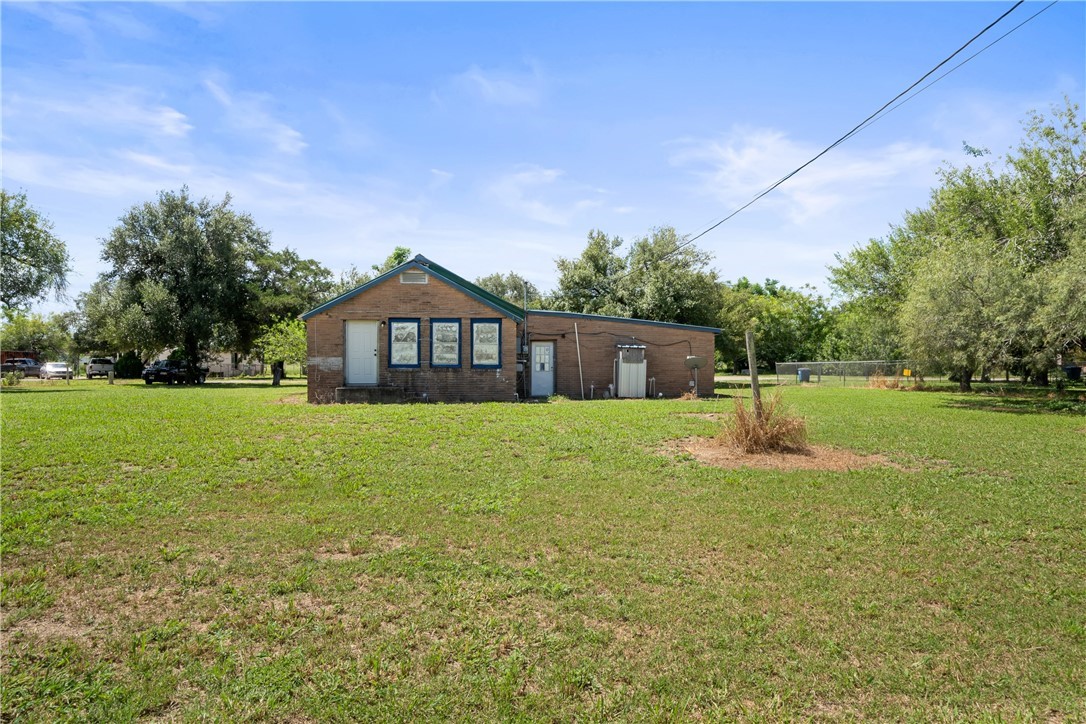 128 Northwest 6th Street Premont, TX 78375 - Photo 14 of 15 a house view with swimming pool in front of it